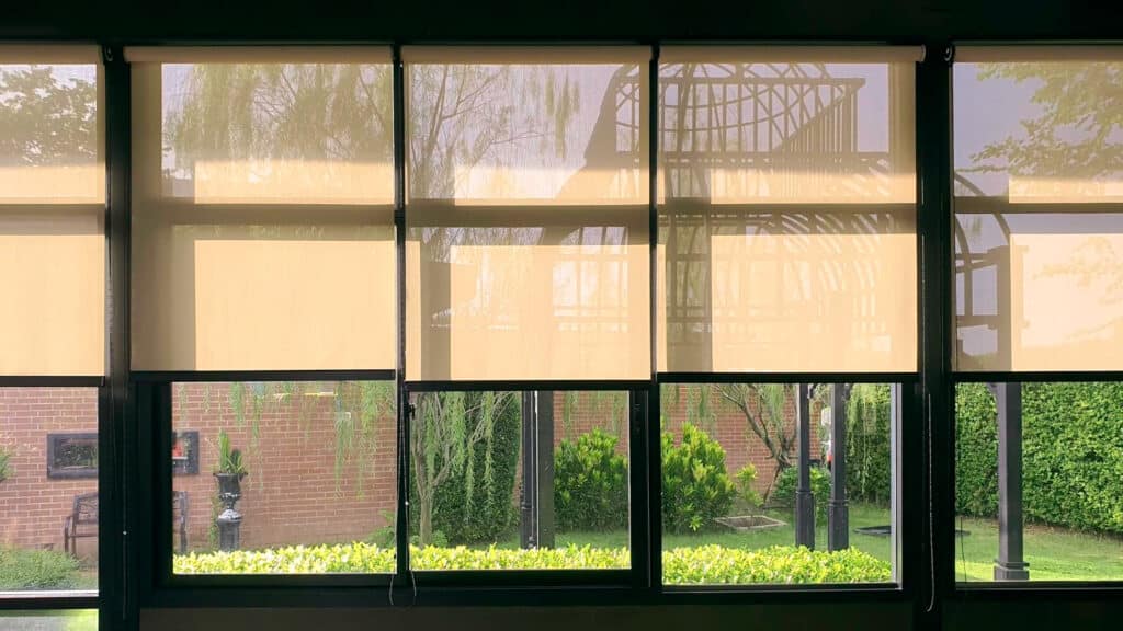 Roll-down screen installed for a wide lanai or patio opening